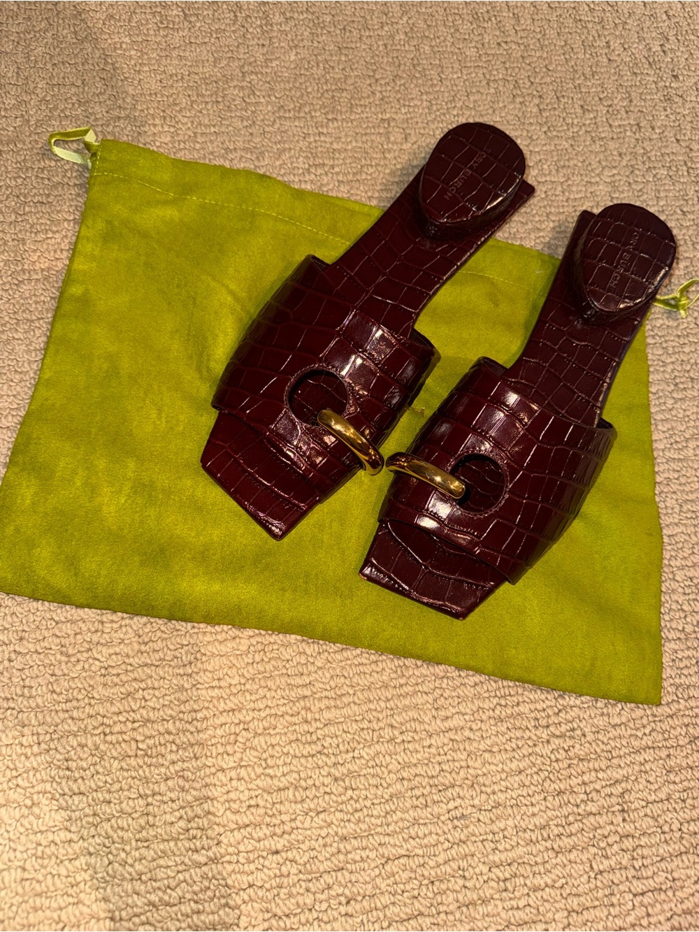 Tory Burch Croc-Embossed Pierced Mules in Dark Burgundy with Gold Hardware